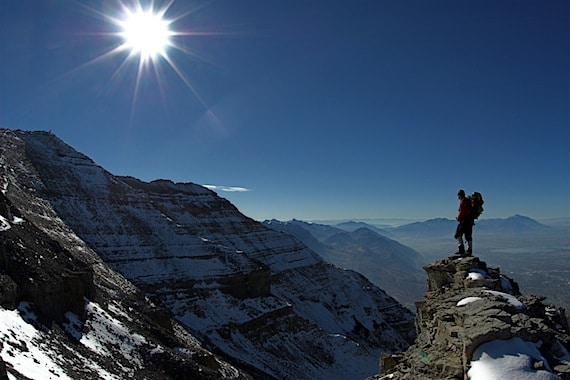 A Lone Hiker Consider the Mountain Before Him - Photo courtesy of ©iStockphoto.com/saunderman, Image #2481475